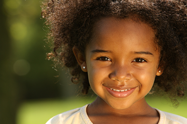 A young girl with a healthy smile